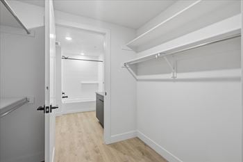 Large walk-in closet with bath attached2